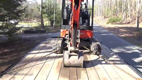 proper way chain down mini excavator|chain down a mini excavator.